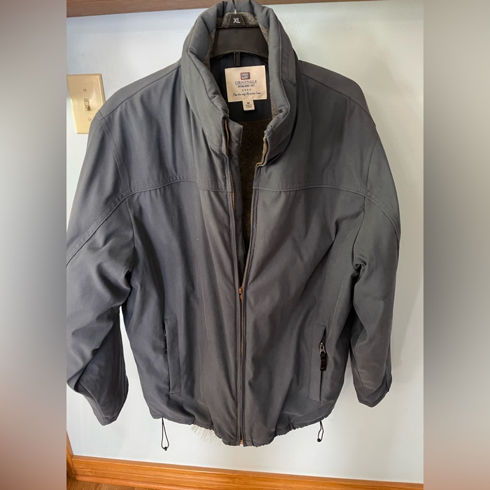 Nice Men's  Blue  Jacket.  Size Medium.with lots of pockets! Great Shape!
